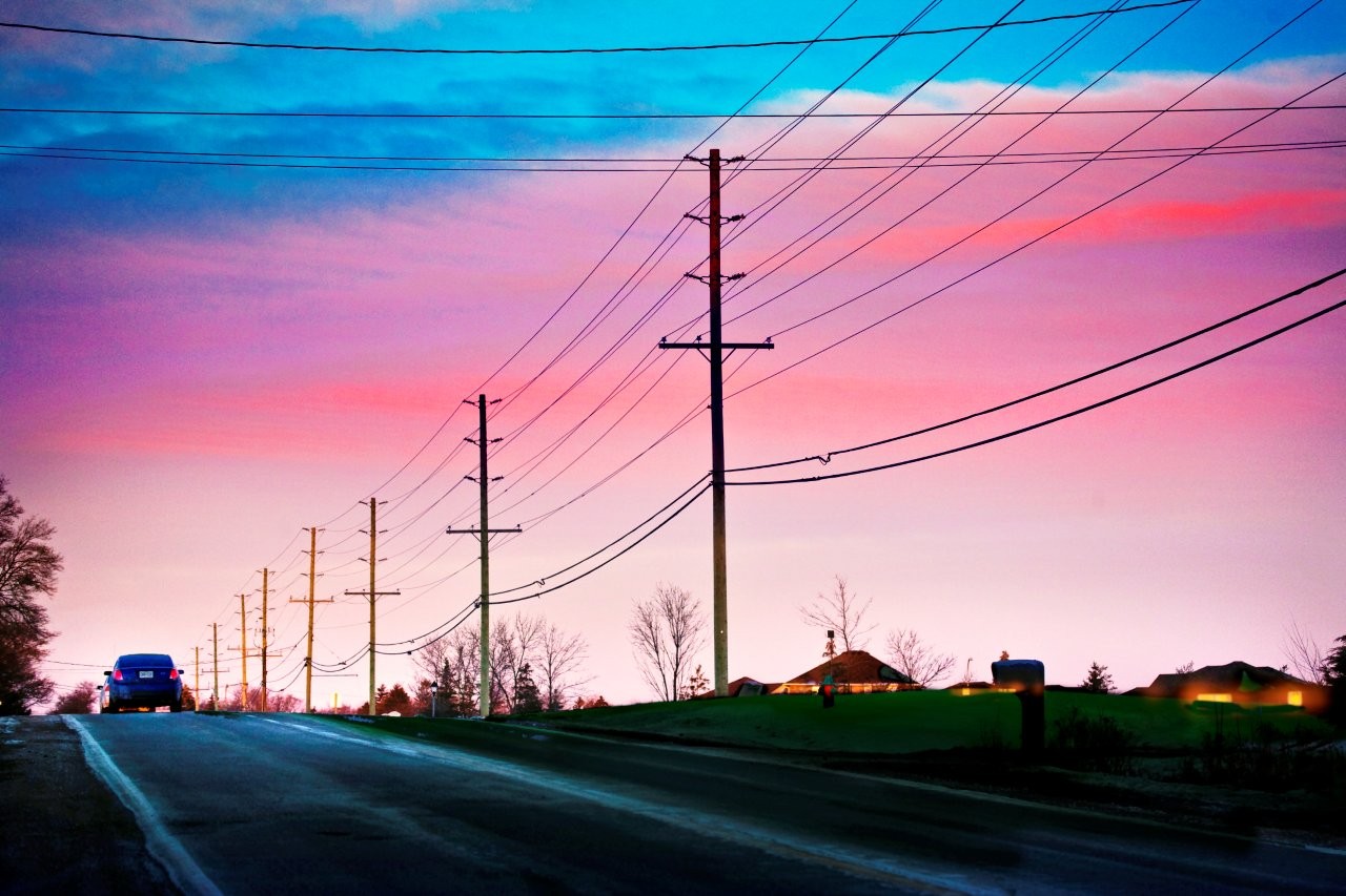 Background Image - Elexicon Employees holding a cheque - Community Engagement